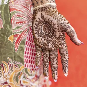 This image showcases the beautiful henna design on a hand