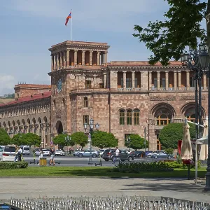 An impressive historic stone building with colonnades