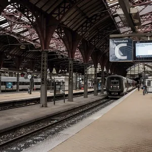 Interior of a train station showing platforms Interior of a train station showing platforms