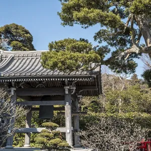 Japanese temple with bell tower and traditional architecture