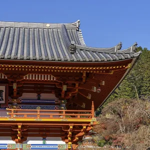 Japanese temple with traditional architecture under blue sky