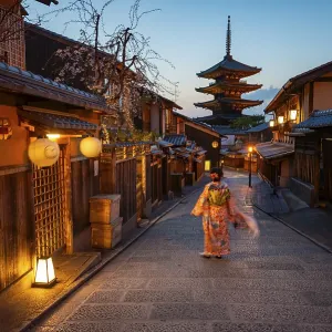 Japanese woman in kimono in an alley Japanese woman in kimono in an alley