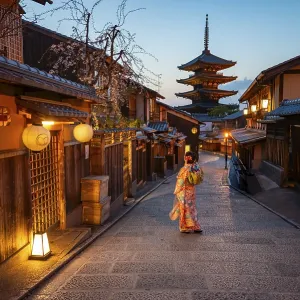 Japanese woman in kimono in an alley Japanese woman in kimono in an alley