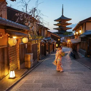 Japanese woman in kimono in an alley Japanese woman in kimono in an alley