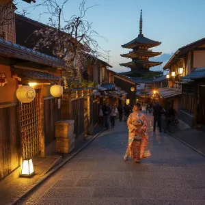 Japanese woman in kimono in an alley Japanese woman in kimono in an alley