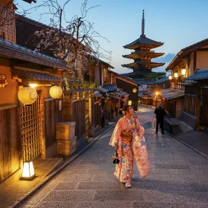 Japanese woman in kimono in an alley Japanese woman in kimono in an alley