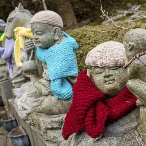 Jizo statues with colourful hats and scarves in Japan