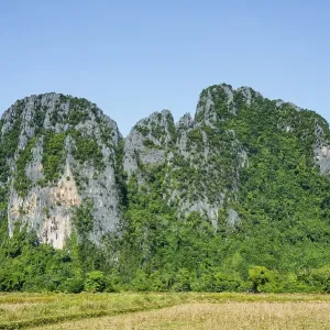 Karst landscape, forested karst mountains Vang Vieng Karst landscape, forested karst mountains Vang Vieng