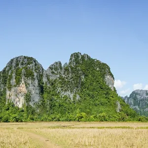 Karst landscape, forested karst mountains Vang Vieng Karst landscape, forested karst mountains Vang Vieng