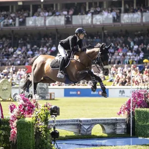 Katie Laurie of Australia and riding Django II compete in the first round of the 1 Katie Laurie of Australia and riding Django II compete in the first round of the 1
