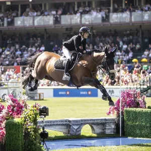 Katie Laurie of Australia and riding Django II compete in the first round of the 1 Katie Laurie of Australia and riding Django II compete in the first round of the 1