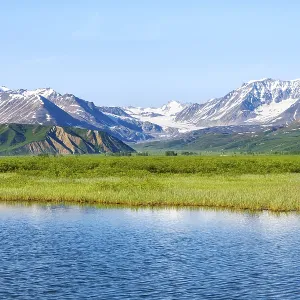 Lake and picturesque mountain landscape with Gulkana glacier and summit Icefall Peak