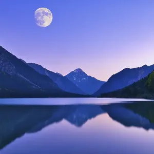 Lake Plansee with full moon, evening mood Lake Plansee with full moon, evening mood