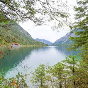 Landscape of a clear lake (Plansee) in autumn in Tirol Landscape of a clear lake (Plansee) in autumn in Tirol