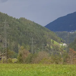Landscape with high-voltage pylons in the Stubai Valley between Telfes and Mieders