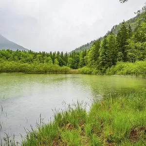 Landscape of Lake Offensee on a rainy day in spring
