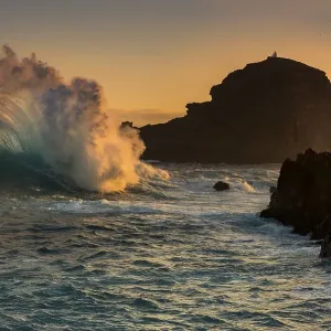 Large wave at sunrise, Porto Moniz Large wave at sunrise, Porto Moniz