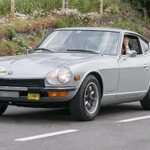Laterally offset frontal view of the Datsun 240 Z with start number 130 Laterally offset frontal view of the Datsun 240 Z with start number 130