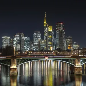 The lights of Frankfurt's banking skyline glow in the evening