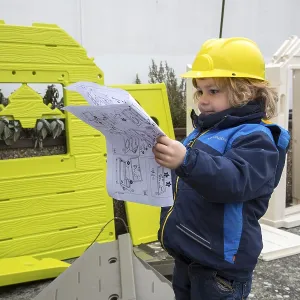 Little boy, 3 years, with toy hard hat Little boy, 3 years, with toy hard hat