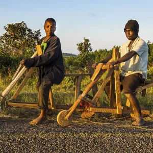Local boys on their self made bicycles, Malawi Local boys on their self made bicycles, Malawi