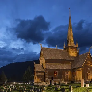 Lom Stave Church at dusk, Oppland, Norway, Europe Lom Stave Church at dusk, Oppland, Norway, Europe