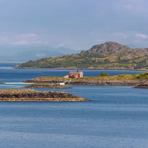A lonely timber house in the archipelago of the Lofoten