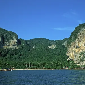 Longtail boat, mountains, Ton Sai beach Longtail boat, mountains, Ton Sai beach