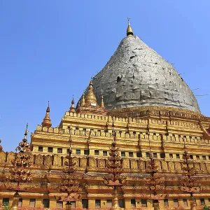 The majestic golden pagoda with its dome rises in Nyaung-U The majestic golden pagoda with its dome rises in Nyaung-U