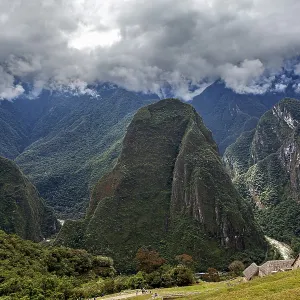Majestic mountains under dramatic cloudy skies