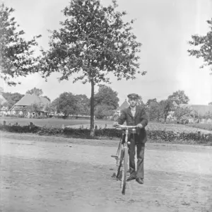 Man with bicycle, cyclist, ca. 1920-1930 Man with bicycle, cyclist, ca. 1920-1930