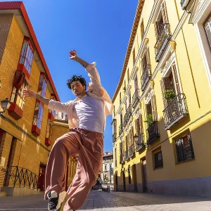 Man Dancing on Madrid Cobblestone Street Print