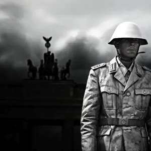 Man dressed as NVA soldier, in front of Brandenburger Gate