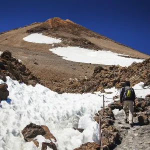 Man hiking on volcano Teide in Tenerife