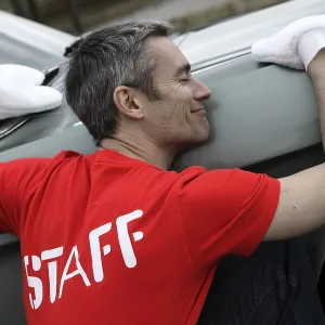Man lovingly caring for his vintage car Man lovingly caring for his vintage car