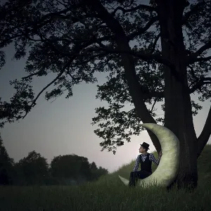 Man sitting in the moon, crescent moon Man sitting in the moon, crescent moon