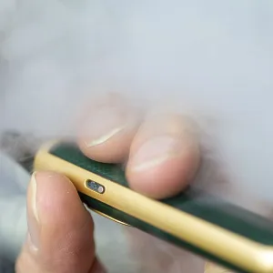 Man vaping an e-cigarette