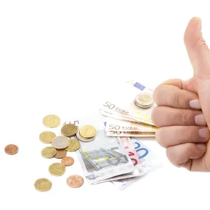 Man's hand with thumb up and money isolated on white<br> Man's hand with thumb up and money isolated on white