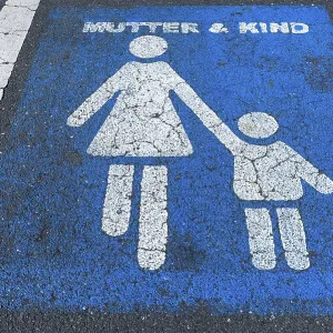 Marking on tar, parking lot for mother and child