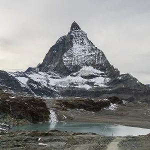 Matterhorn Mountain and Theodulgletschersee Lake on Cloudy Day