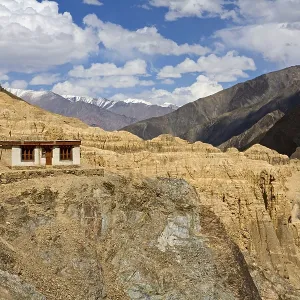 One of meditation cell of Lamayuru Buddhist Monastery rising above mass of eroded cliffs on Leh Kargil road One of meditation cell of Lamayuru Buddhist Monastery rising above mass of eroded cliffs on Leh Kargil road