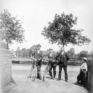 Men with bicycles, cyclists, hat Men with bicycles, cyclists, hat