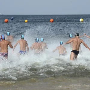 Men running into the sea, Swinoujscie