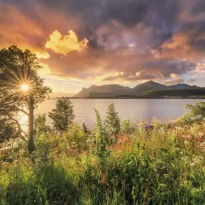 Midnight sun in midsummer by the fjord Midnight sun in midsummer by the fjord
