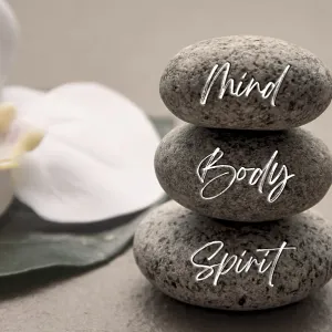 Mind, Body and Soul words engraved on zen stones with space for text