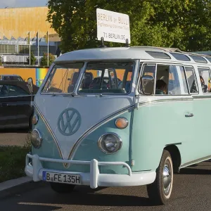Mint green VW vintage bus on a street in Berlin