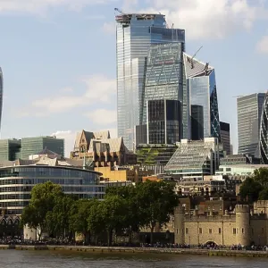 A mix of modern and historic architecture lines the riverfront in London