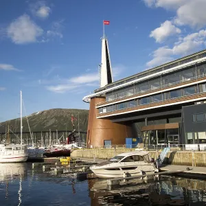 Modern architecture of Scandic Hotel with boats in harbour