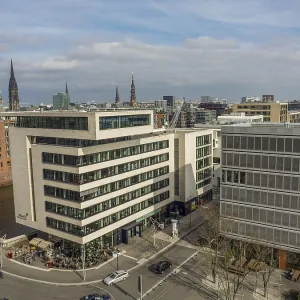 Modern city architecture with office buildings under clear skies