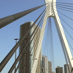 Modern city view over suspension bridge support